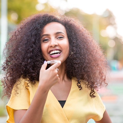 Midlothian patient smiling with clear aligners