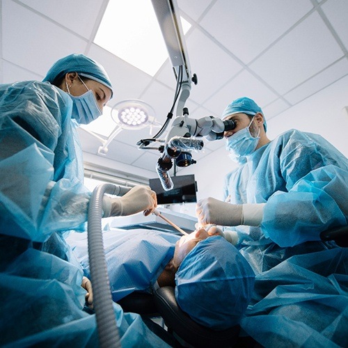 an oral surgeon performing the dental implant procedure in Midlothian