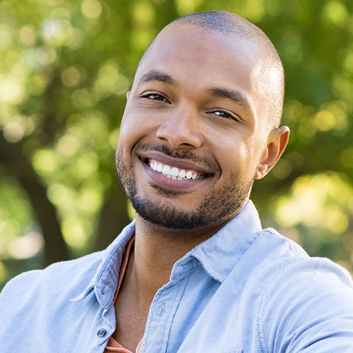 Man with bright smile after teeth whitening