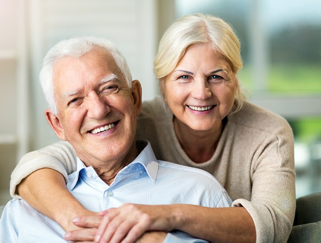 Happy senior couple smiling together