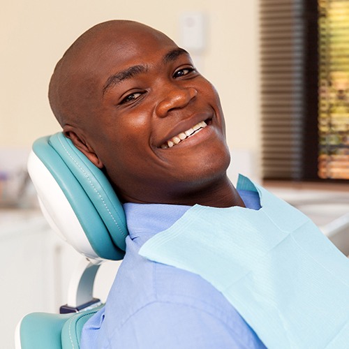 Man in dental chair for preventive dentistry
