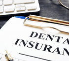 a dental insurance form on a table