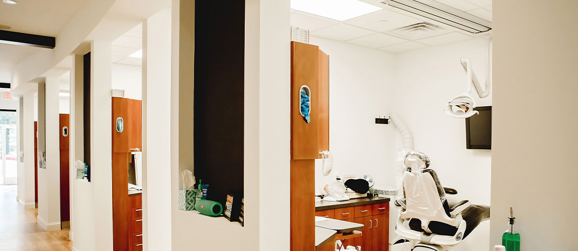 Looking into dental exam room from hallway