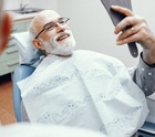 Patient smiling at dentist in Midlothian