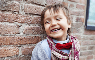 Young boy with healthy smile after children's dentistry